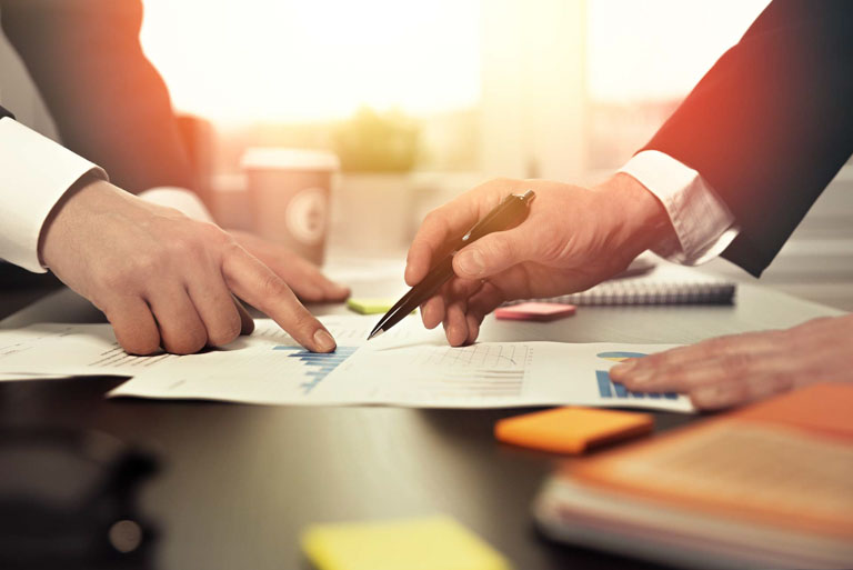 Photo ID: B06. Two businessmen at work in office, Working day, business process on desk, financial manager at work