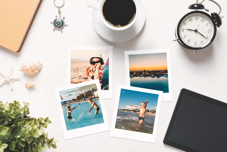 Photo ID: C06. Vacation frames. Printed photographs, photo lab concept, top view