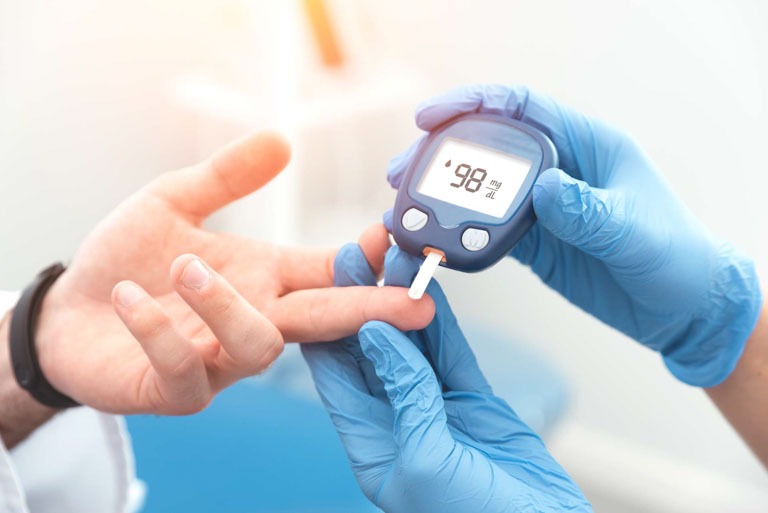 Photo ID: H07. Doctor making blood sugar test in clinic. Diabetes concept