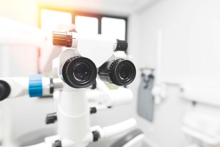 Photo ID: H10-1. Dental endodontic binocular microscope. Closeup of a dentist microscope for a teeth