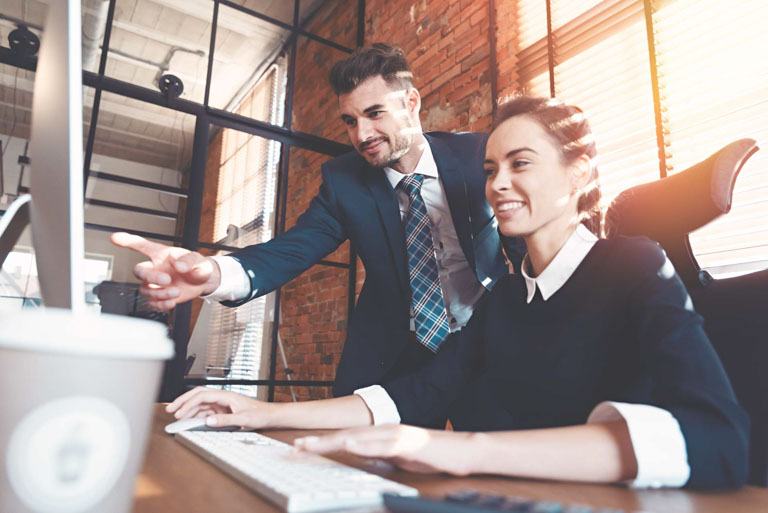 Photo ID: L14. Two business person working together. Consultation at the office